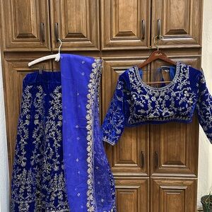 Royal blue velvet lehenga with gold embroidery. Worn once. Size L (40).